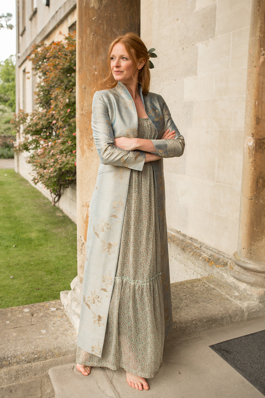 Silver long raw silk coat with golden flowers. Long coat for brides in light blue.
