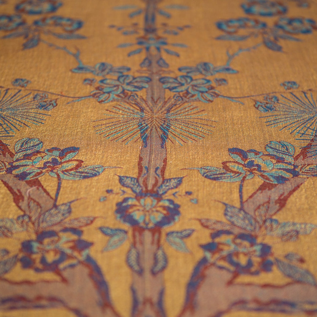 Close-up of floral patterned fabric with yellow background