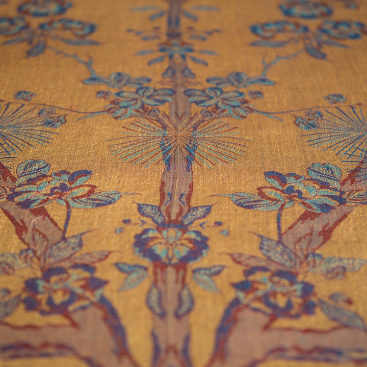 Close-up of floral patterned fabric with yellow background