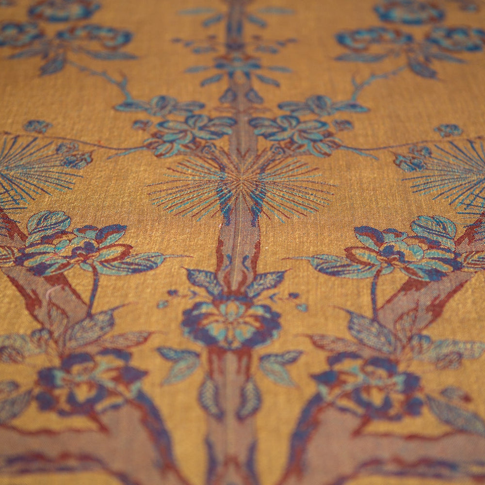 Close-up of floral patterned fabric with yellow background