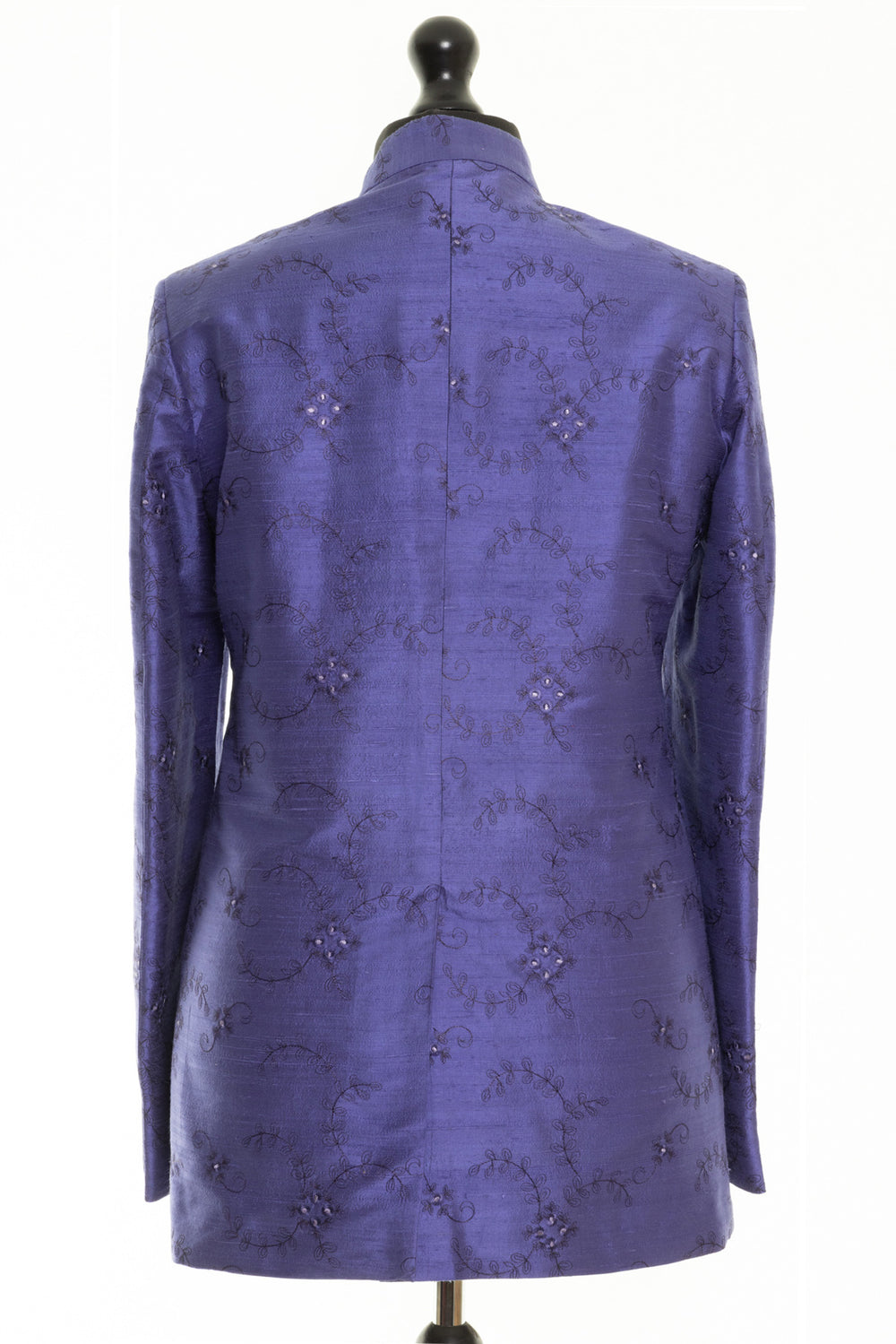 Unique groom's jacket in blue with floral embroidery. This jacket can be made to measure.