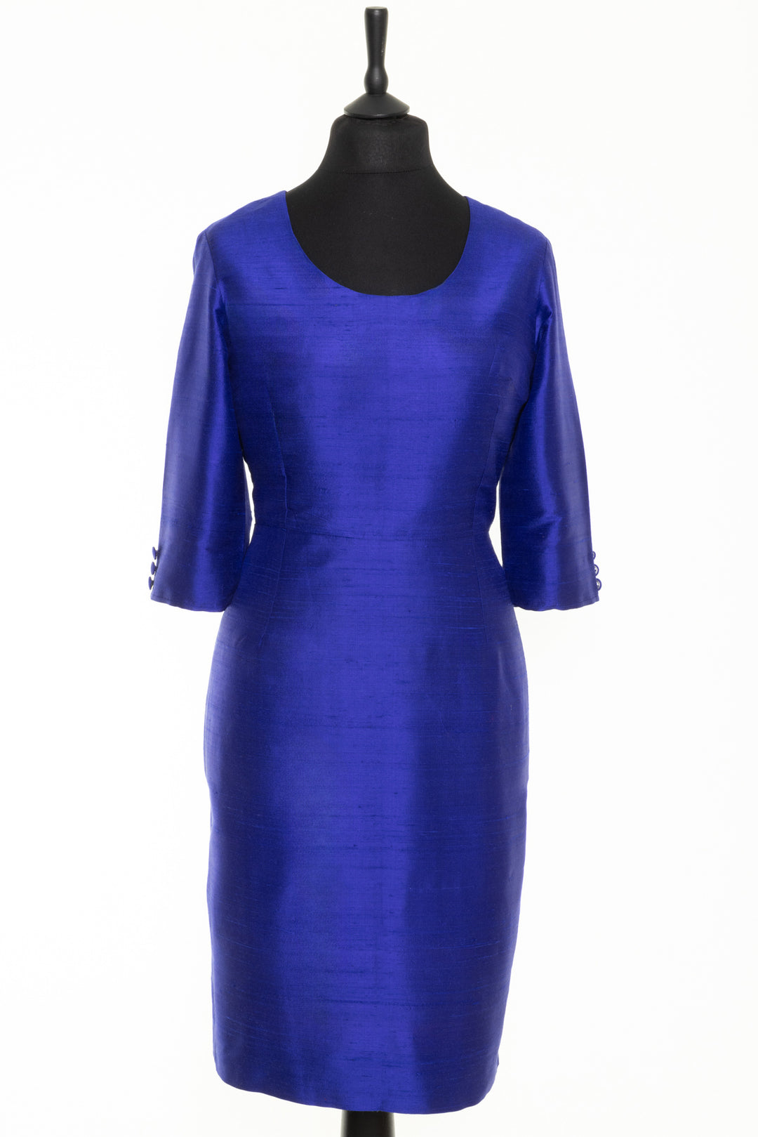 Elegant raw silk dress in blue that is suitable for wedding guests. Knee length dress for mature ladies.