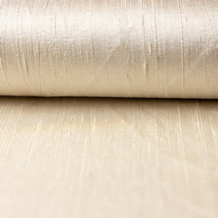 Cream silk fabric for bridal dresses and coats.