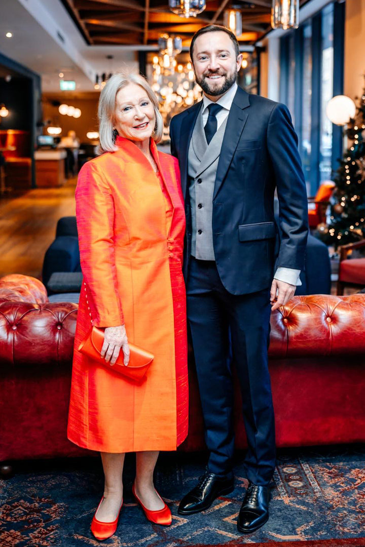 Bright orange fitted silk coat for mother of the groom. Elegant buttoned coat made from raw silk. Wedding outfit for mother of the groom.