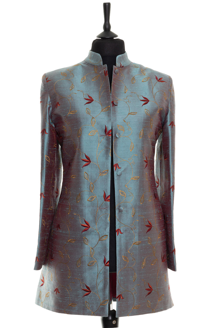 Mandarin collar jacket for women. This smart jacket is handmade from silk in smokey blue with floral embroidery.
