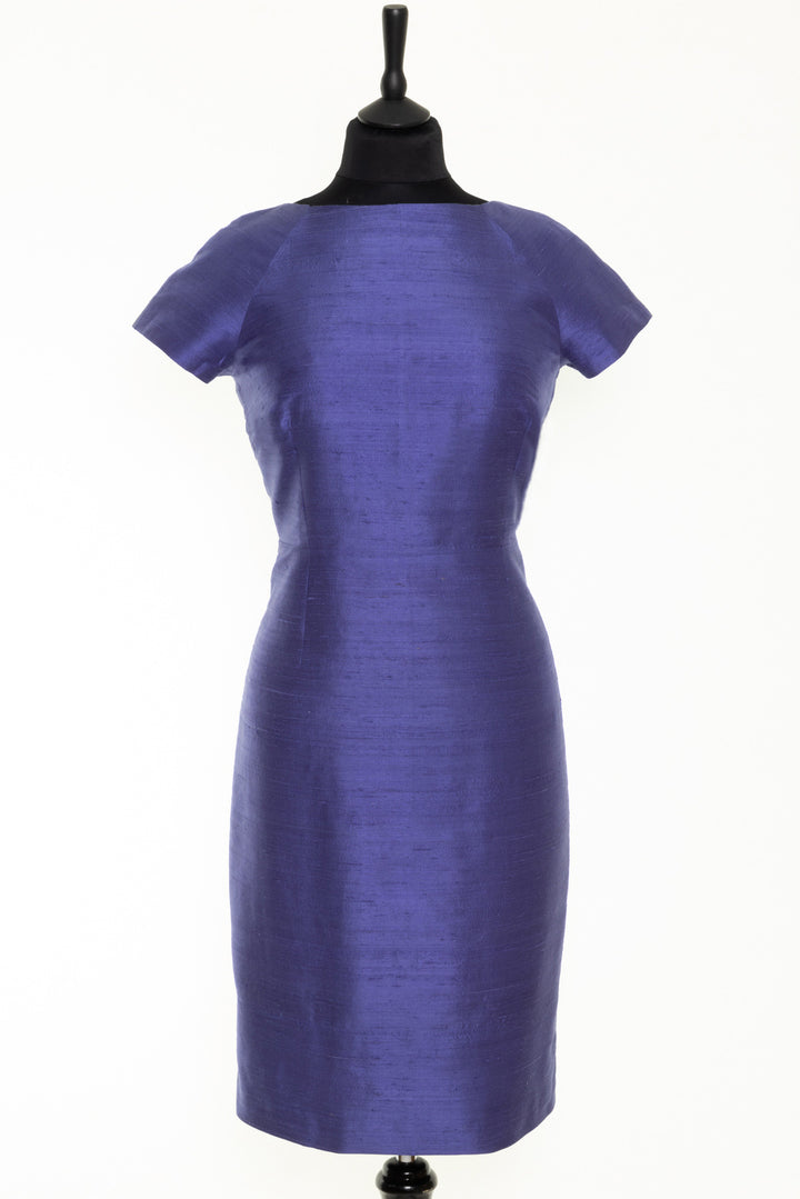 Raw silk dress in periwinkle. Blue shift dress for weddings. This dress has a straight bateau neckline and short sleeves ideal to wear under a coat.