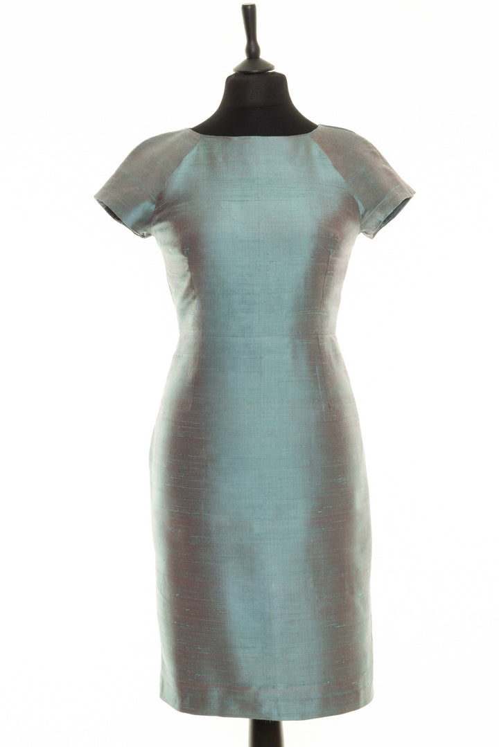 Smokey blue dress with bateau neck. Ladies dress with short sleeve and fitted waistline.