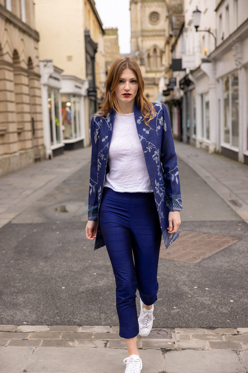 long tree of life cashmere jacket in blue with silk blue trousers