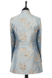 Womens longline jacket in a gold and pale blue embroidered raw silk with a darker gold pattern