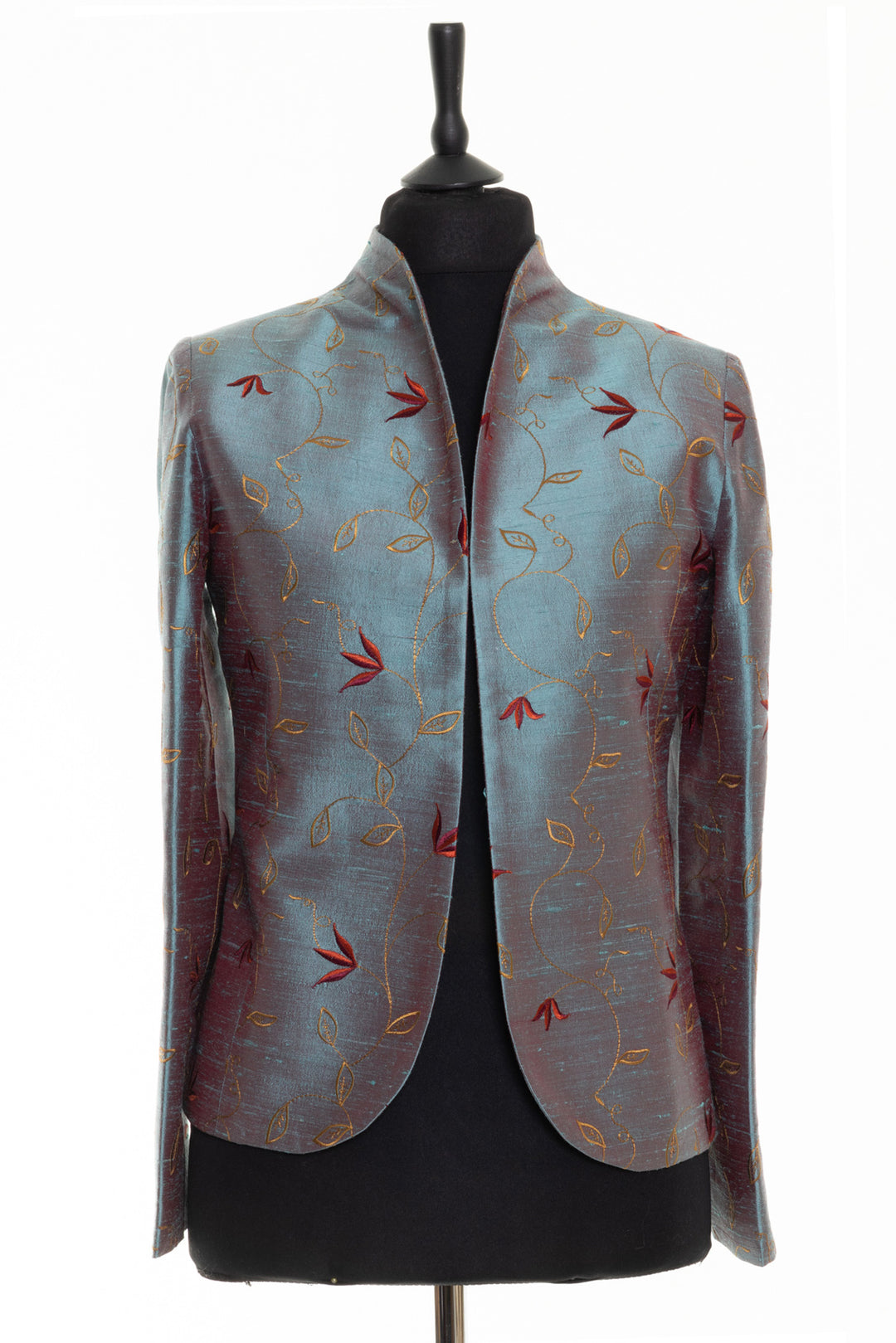 Shibumi Anya jacket in Paris. Embroidered silk jacket in smokey blue with red and yellow flowers. Open silk jacket for mother of the groom.