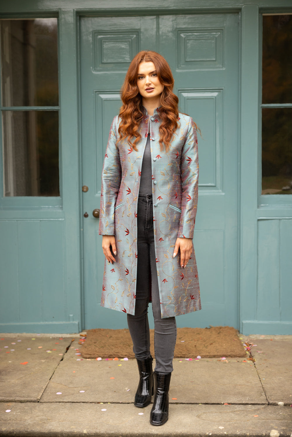 Nehru coat in Paris. Knee length coat in smokey blue silk with soft floral embroidery. Wedding guest coat.