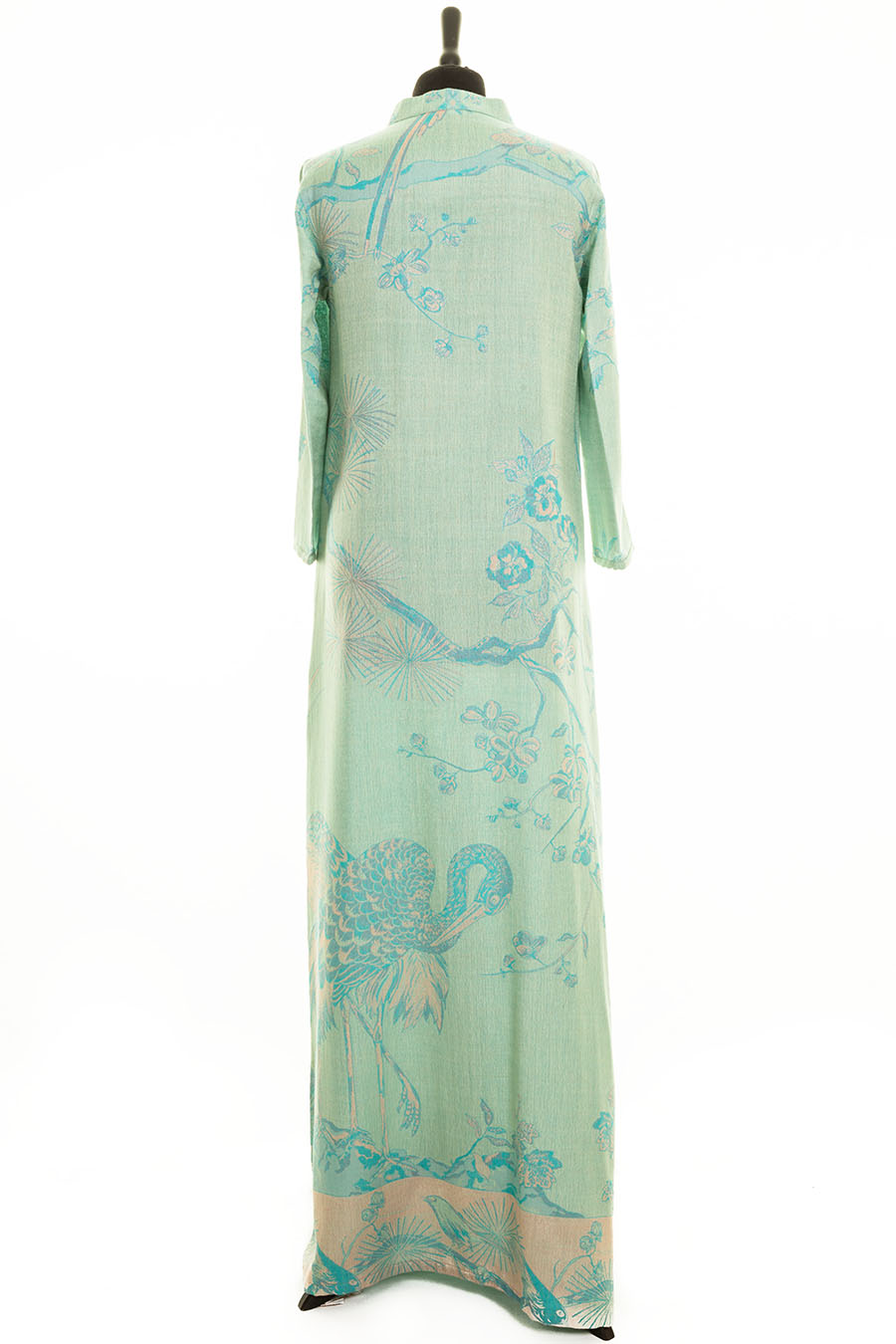 Maxi dress in light green with tree of life pattern.