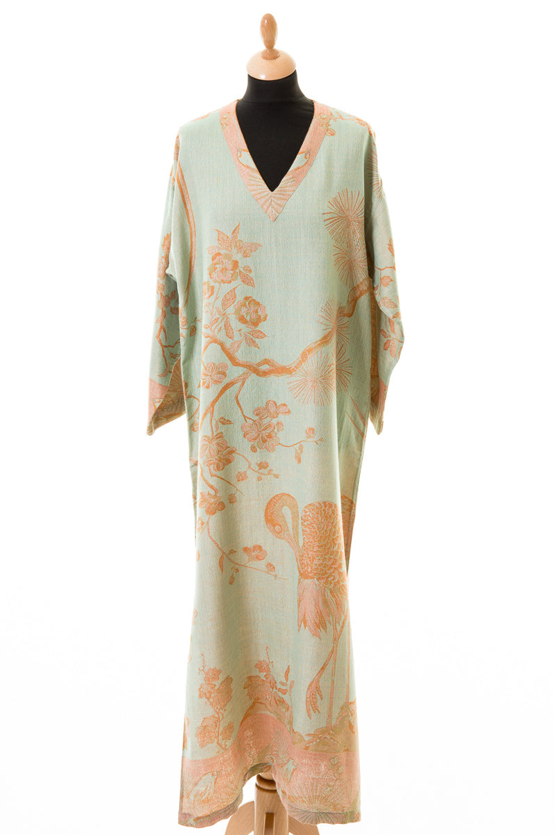Plus size beach dress. Elegant kaftan dress in light green.