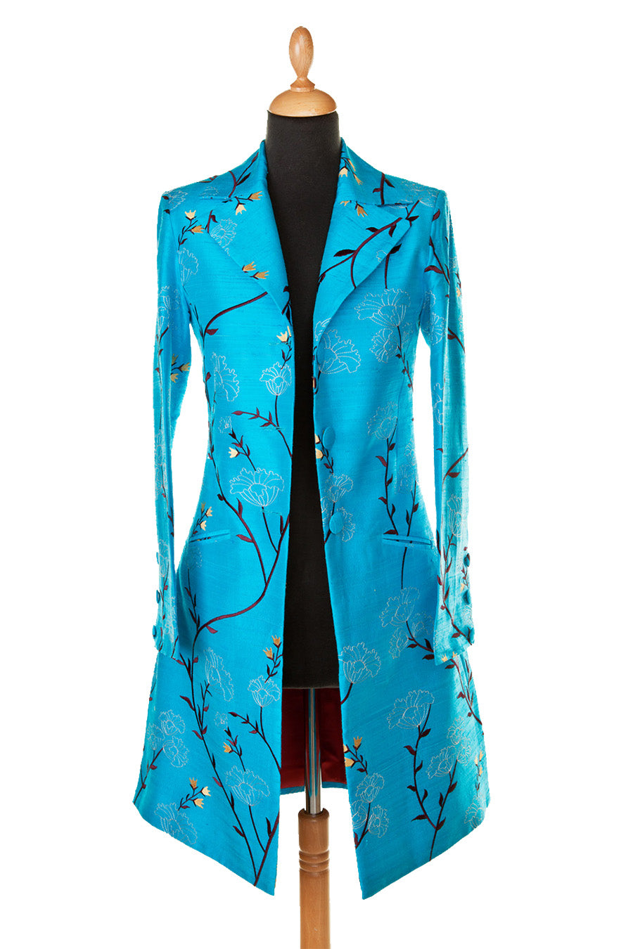 Turquoise colour coat for women, mid length wedding guest coat. Soft embroidery in black and yellow. Floral pattern coat.