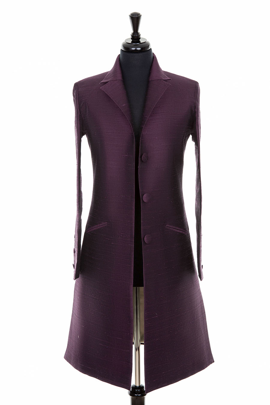One coloured dark purple silk women's coat. Knee length raw silk coat with three buttons at the front.