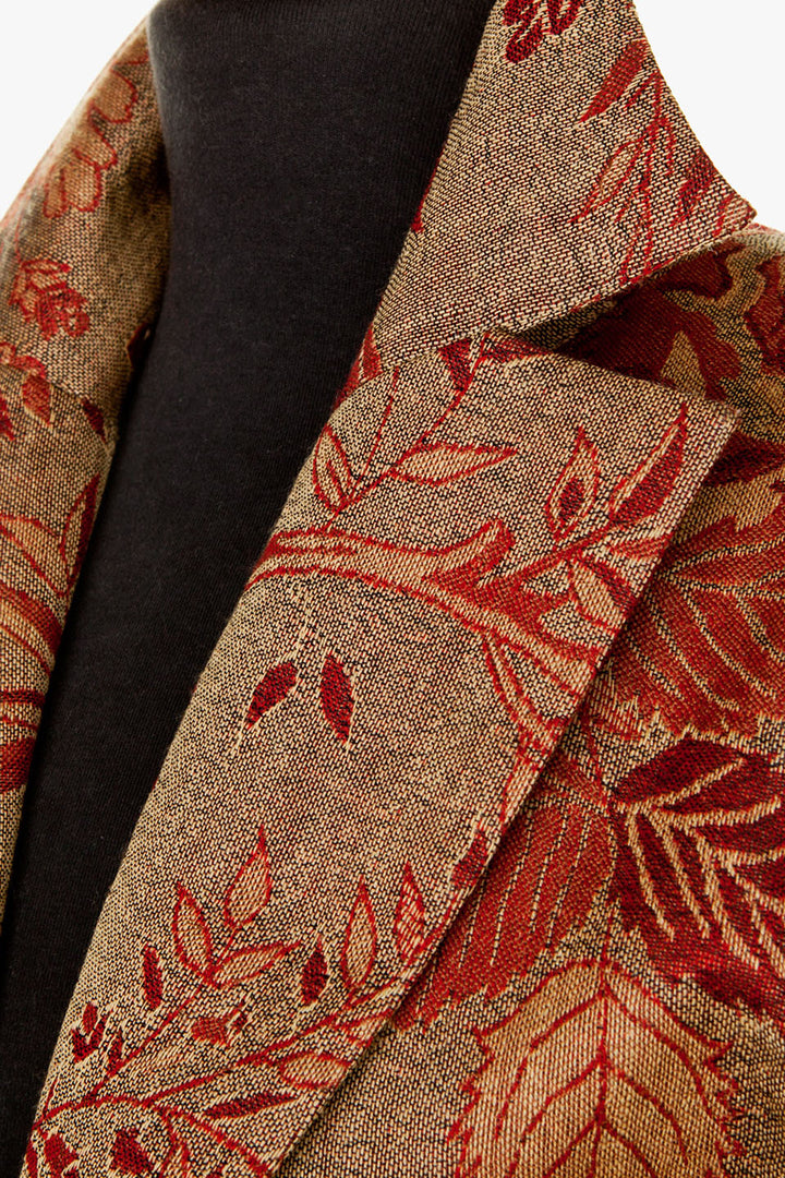 Top collar detail of a red brown coat.