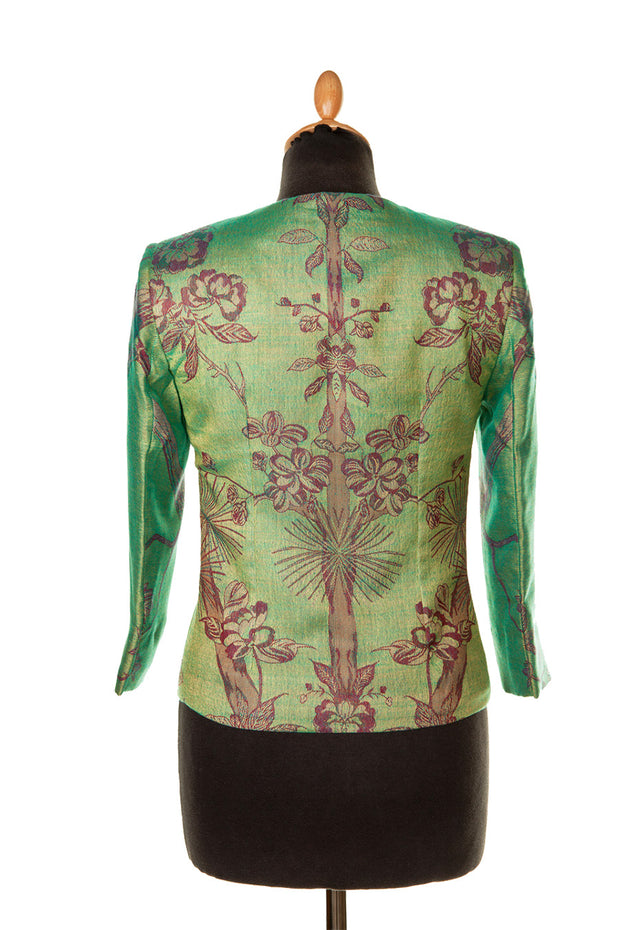 the back view of women's cashmere jacket in green and red
