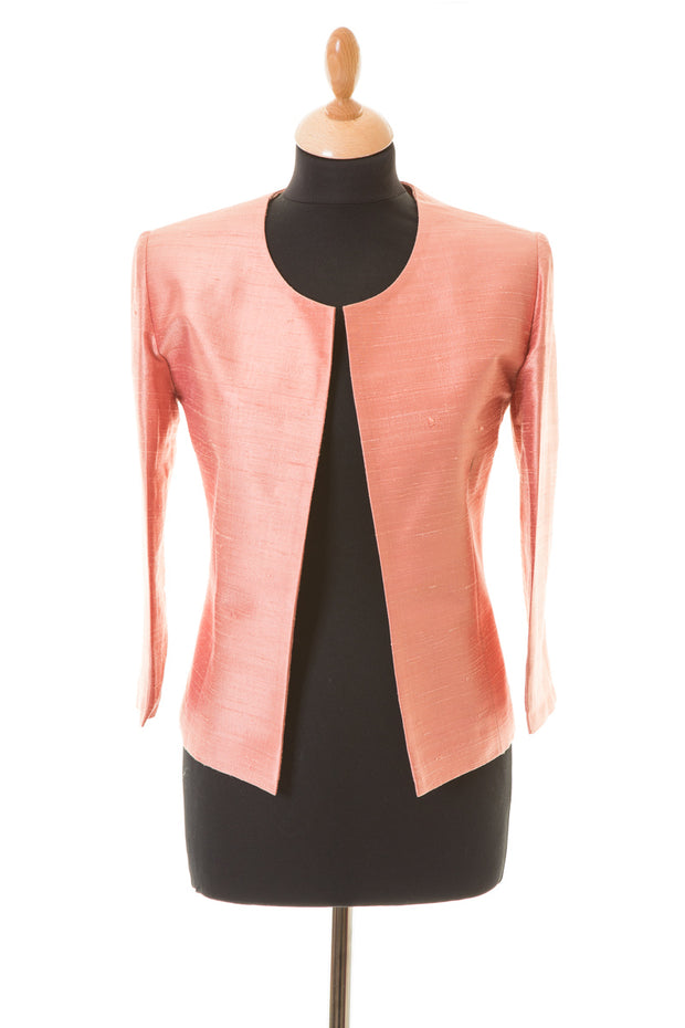 Short jacket in blush made from silk. 