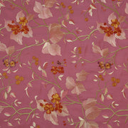 pink embroidered fabric with flowers 