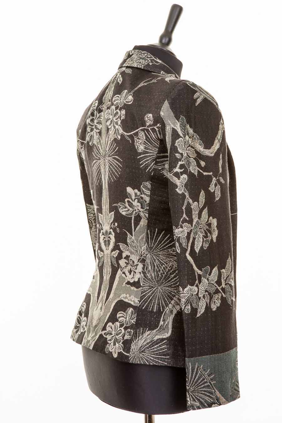 Black short women's jacket made from cashmere with floral pattern.