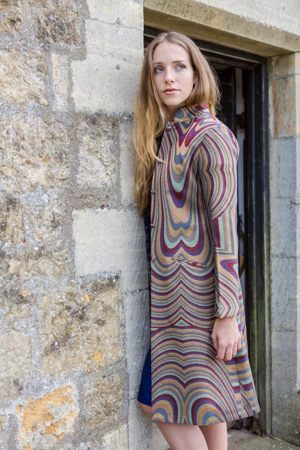 Multicoloured coat in red, blue and yellow.