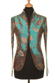 Short smart jacket for the opera in teal. 