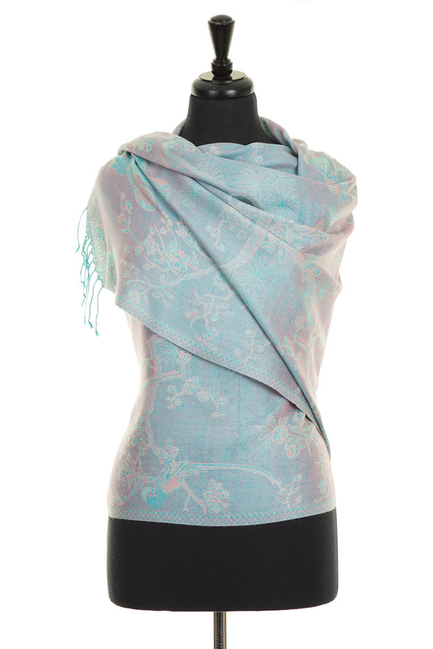 pashmina scarf for women. Light blue coloured scarf with soft flower pattern and birds. 