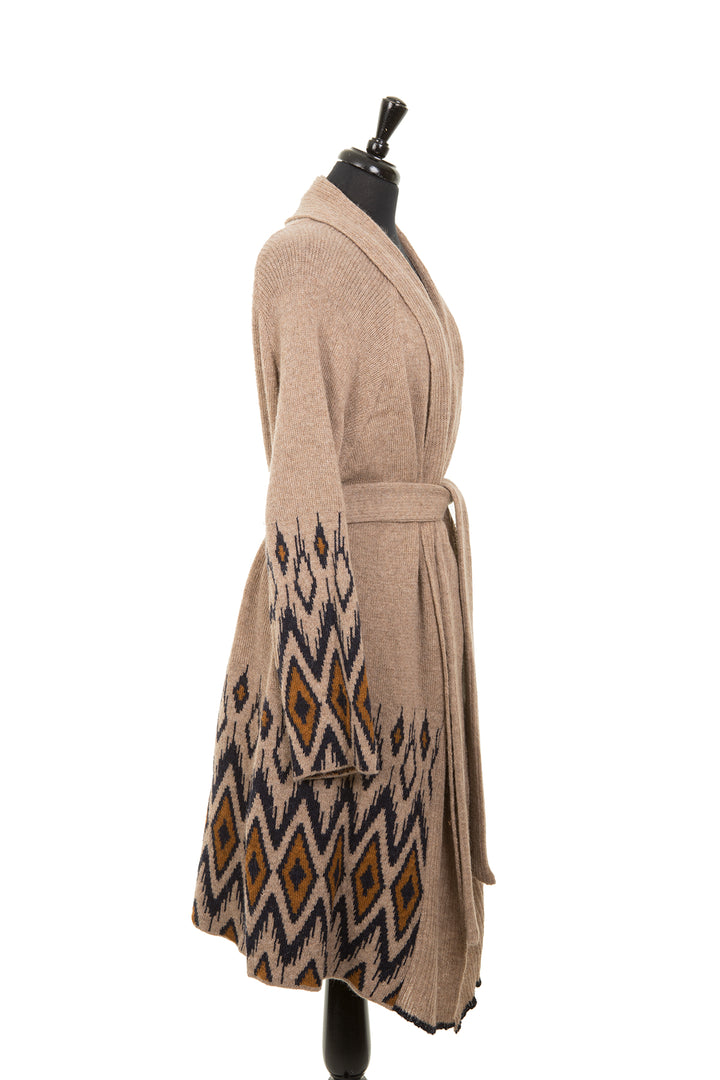 Beige cardigan with a belt on mannequin.