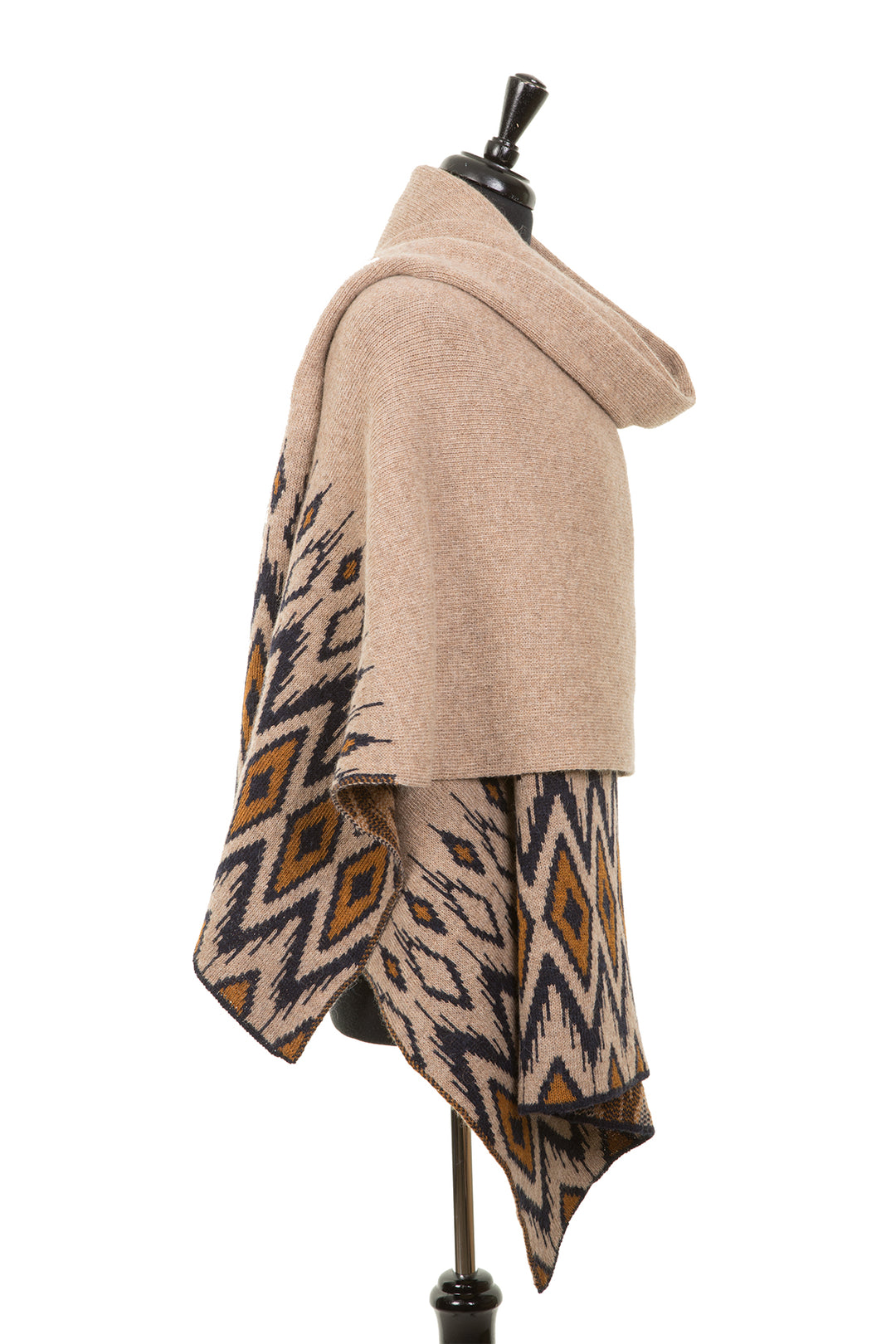 Large wool shawl in beige with geometric pattern.
