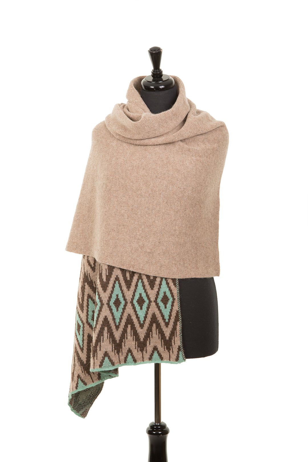 Wool scarf on a mannequin in beige colour.