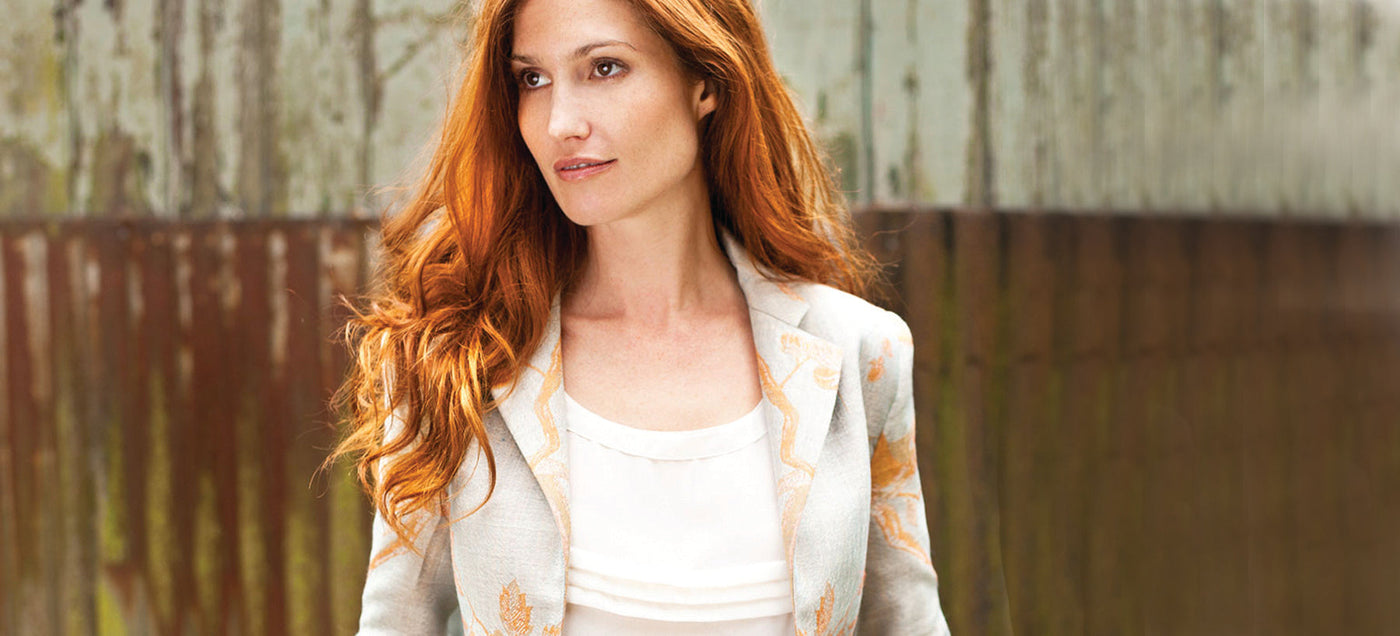 Woman wearing a patterned cashmere blazer