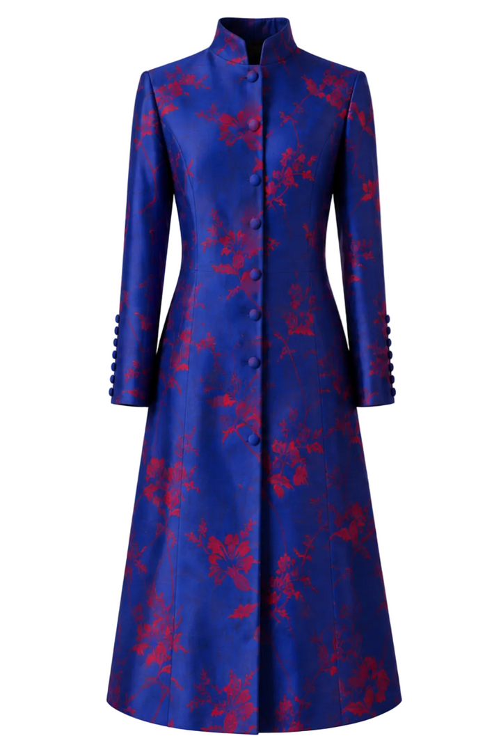 A long blue coat with a red floral pattern, shown from both the front and back views against a plain white background.