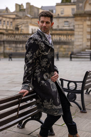 man wearing long coat in black cashmere in City of Bath
