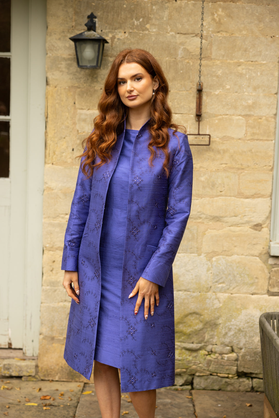 Blue embroidered silk coat with matching dress by Shibumi. Amazing wedding guest outfit. The dress is fitted in periwinkle colour with an embroidered silk coat also in periwinkle. 
