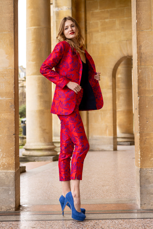 luxury red silk ladies suit perfect for a wedding guest 