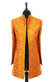 Womens long nehru jacket in a bright yellow embroidered raw silk with a small pattern in burgundy