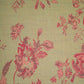 green fabric with ref florals