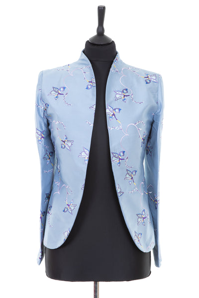 woman's blazer in light blue with embroidered flowers