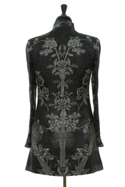 Back of black jacket with beautiful white flower pattern.  Cashmere jacket for women.