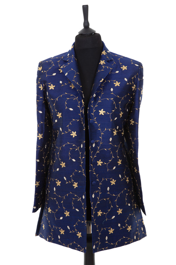 Womens longline blazer style jacket in a bright navy blue embroidered raw silk with a gold pattern