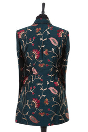 Womens longline blazer style jacket in a dark green embroidered raw silk with a floral pattern in gold, blush and red