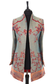Womens longline dress jacket in dark green cashmere fabric with the Tree of Life pattern in red, orange and blue