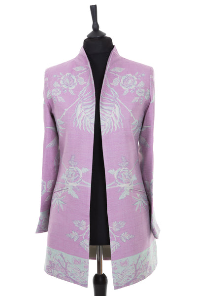 Womens longline jacket with a soft curved collar in a bright lilac cashmere fabric with the Tree of Life pattern in pale aqua