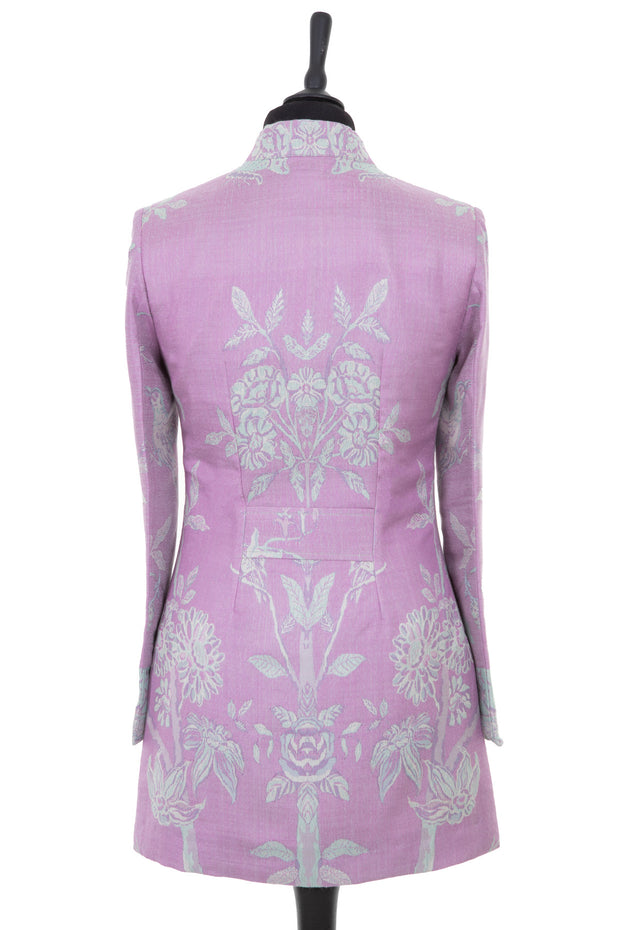 Womens longline jacket with a soft curved collar and half belt, in a bright lilac cashmere fabric with the Tree of Life pattern in pale aqua