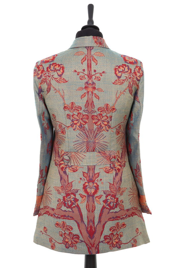 Womens longline blazer style jacket in a dark green cashmere fabric with the Tree of Life pattern in red, orange and blue
