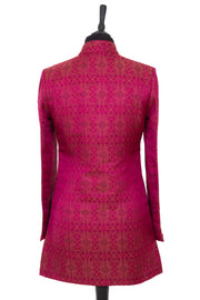 Womens long nehru jacket in a deep pink jacquard embroidered silk with gold, aubergine and black details.
