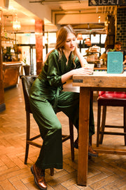 silk jumpsuit in green with wide leg and mid length sleeves 