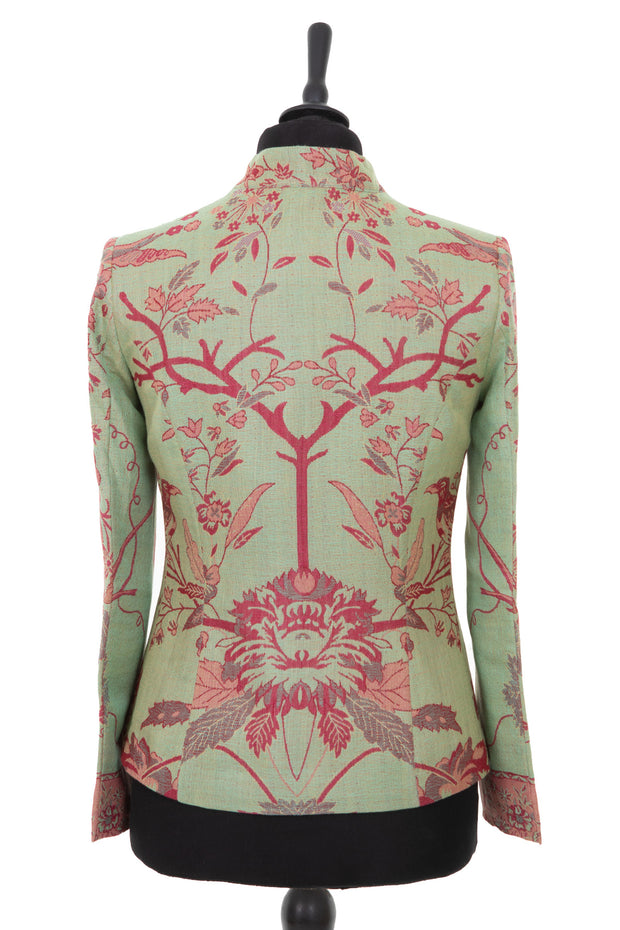 Womens short dress jacket in a light green cashmere fabric with a pink floral pattern