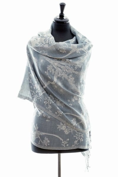 Cashmere silk blend shawl in a blue toned grey cashmere fabric with a pale grey floral pattern