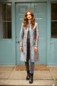 Nehru coat in Paris. Knee length coat in smokey blue silk with soft floral embroidery. Wedding guest coat. 